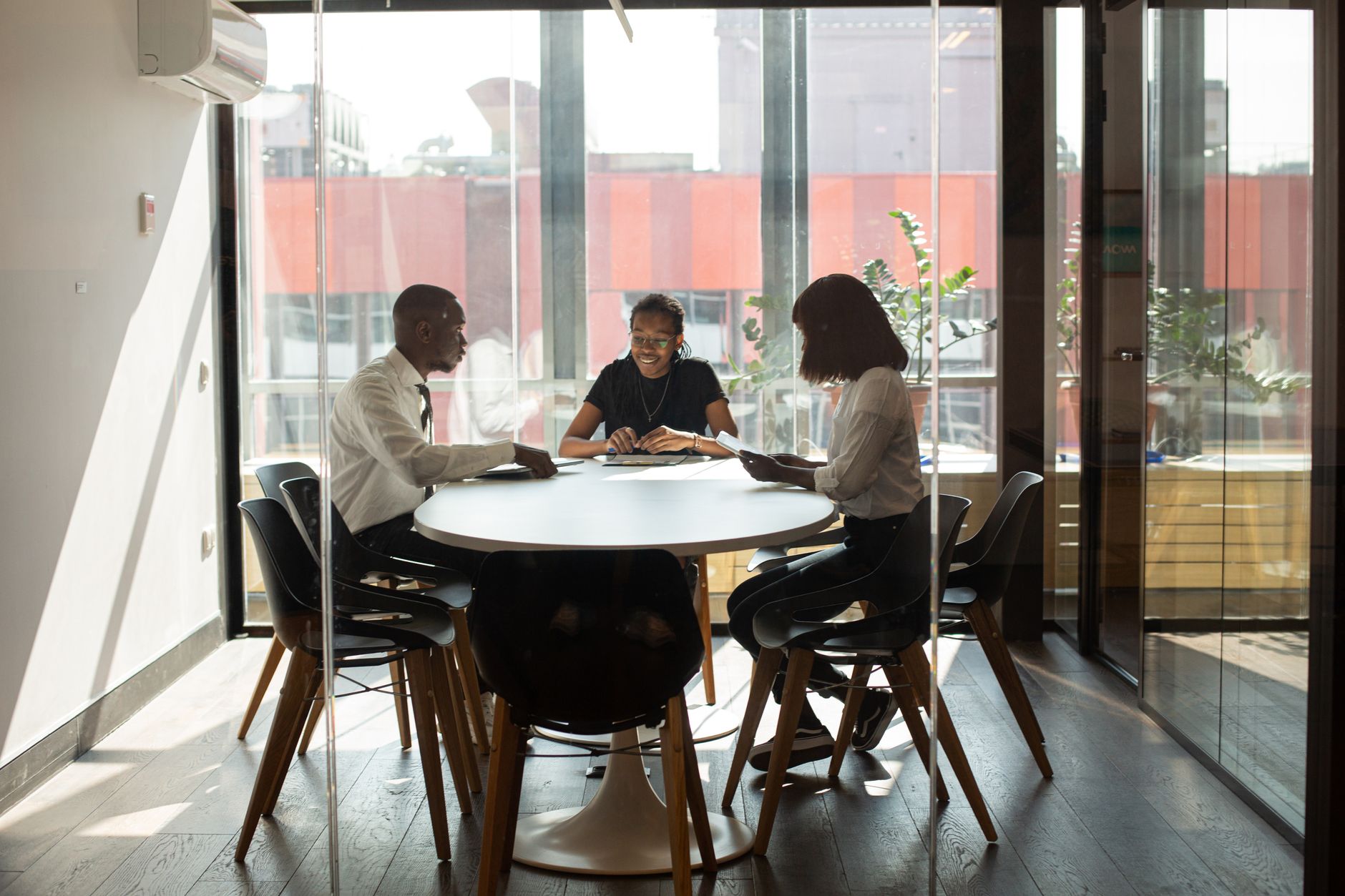 Corporate sponsor meeting at high-rise office in Sandton