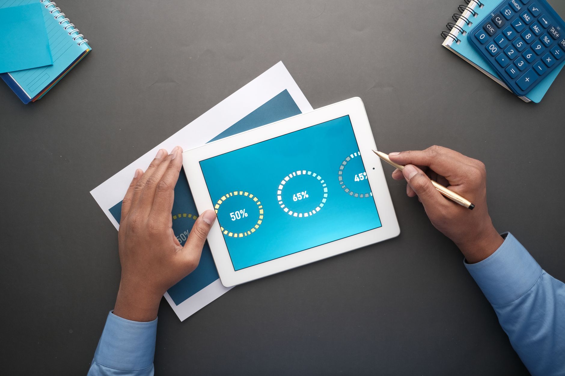 Marketing professional reviewing complex metrics